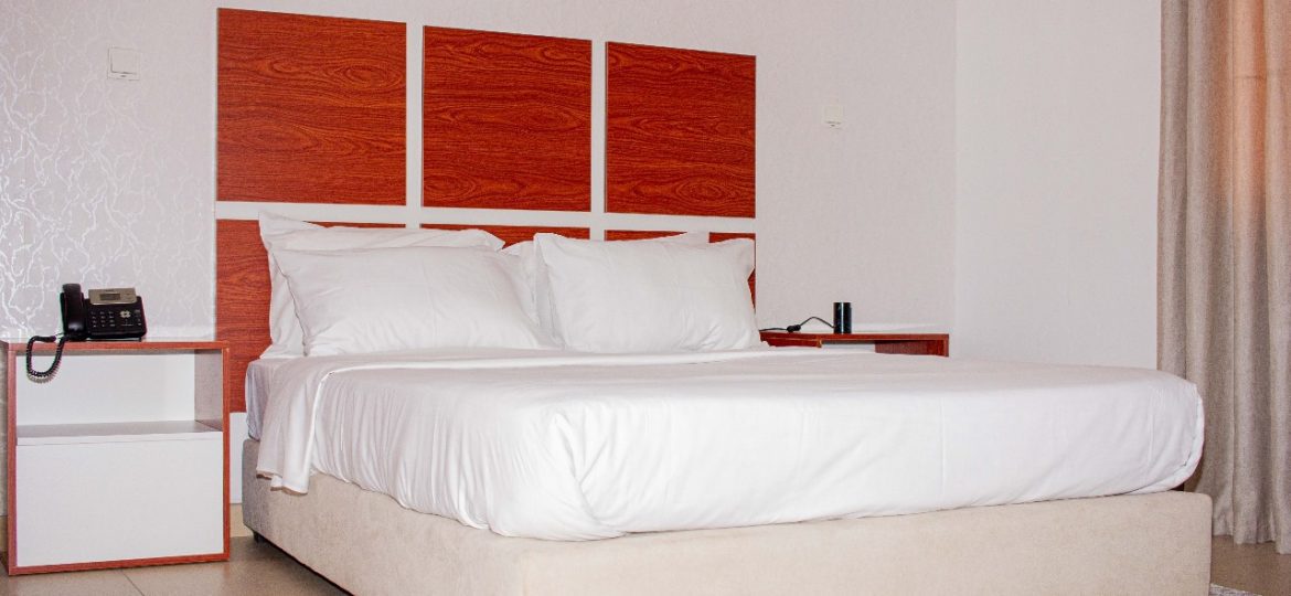 Modern hotel room with a comfortable bed and stylish decor