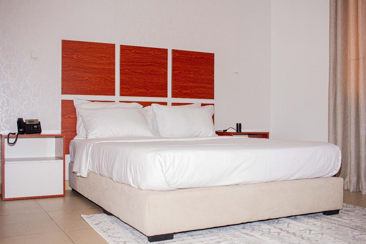 Modern hotel room with a comfortable bed and stylish decor